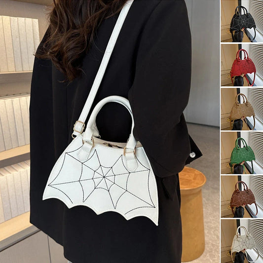 Trendy spider web-patterned shoulder bags in various colours, perfect for adding a spooky-chic touch to your Halloween outfit