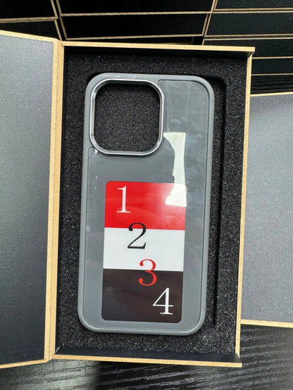 A customizable phone case with an e-ink display that allows users to wirelessly project their preferred images.