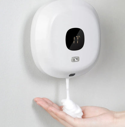 Smart sensor wall-mounted soap dispenser in white and blue, featuring contactless operation and temperature sensing