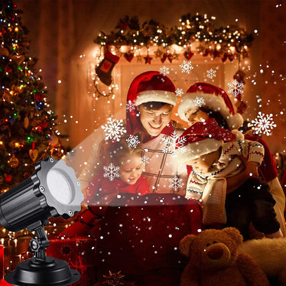 LED Christmas Blizzard Snowflake Laser Light Projector illuminating a garden with white snowflake patterns