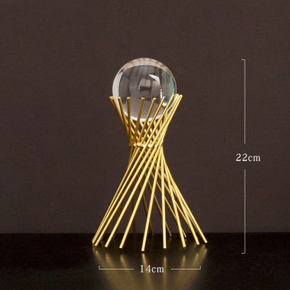 Elegant crystal ball home decor ornaments with a luxurious golden metal finish and minimalist modern design