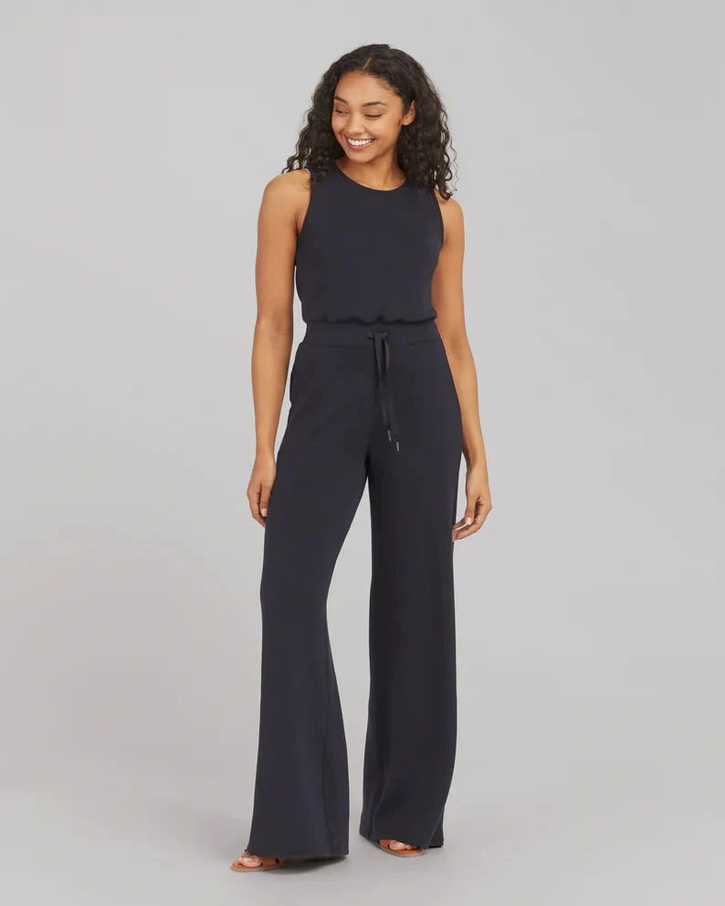 Women's lace-up jumpsuit pants in polyester, sleeveless design, available in multiple colors and sizes