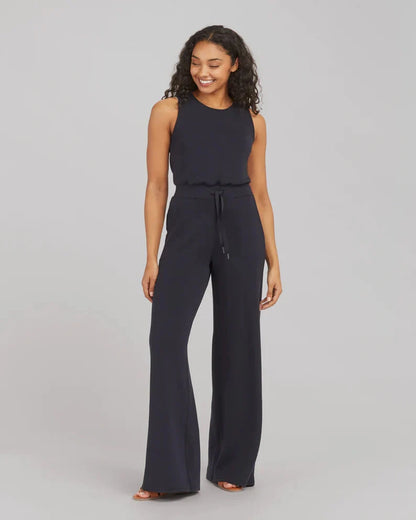Women's lace-up jumpsuit pants in polyester, sleeveless design, available in multiple colors and sizes