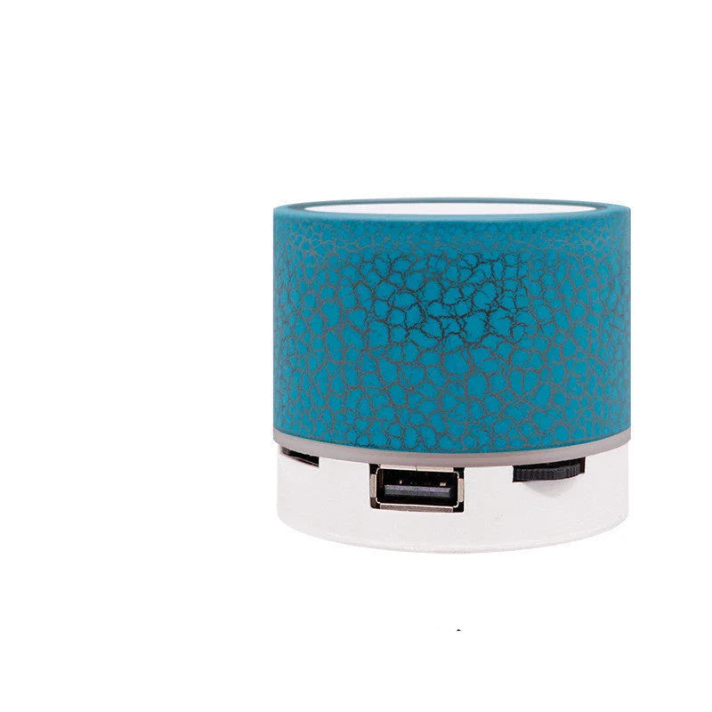 Portable Bluetooth speaker with colorful changing lights, high-quality audio, and durable design for on-the-go use
