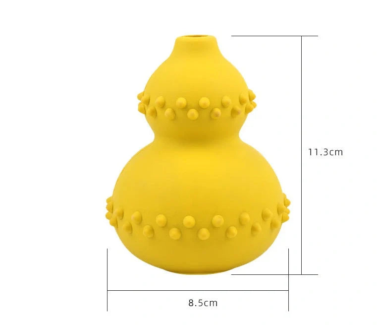 A durable, interactive dog toy made of natural rubber that dispenses treats as the dog plays with it