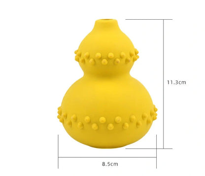 A durable, interactive dog toy made of natural rubber that dispenses treats as the dog plays with it