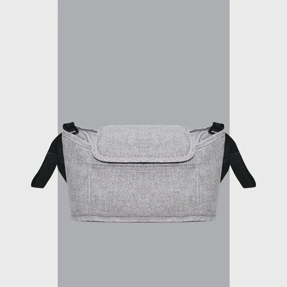 Stylish baby pram organiser bag made of premium cotton and linen materials, featuring various compartments and colour options to keep your child's essentials organised.