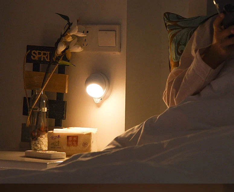 A versatile smart sensor lamp with a 360-degree rotating head and magnetic backing for easy installation on any iron surface.