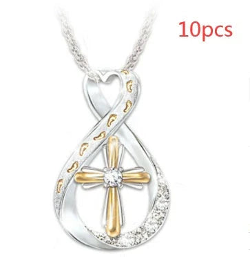 Elegant two-tone cross pendant with diamond-like accent, versatile and durable alloy design for everyday or special occasions.