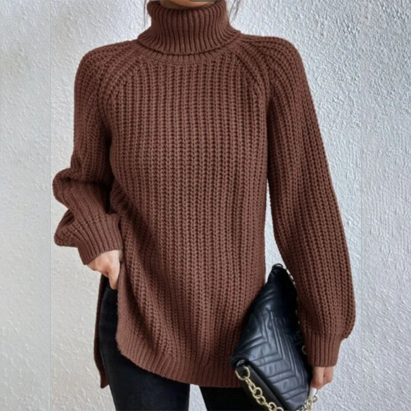 A stylish turtleneck pullover sweater with a unique split design, available in a variety of classic colours and sizes.