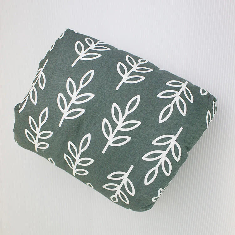 Adjustable baby nursing arm pillow in various colors and patterns, including dark blue, gray, pink, and more. Features soft, breathable cotton fabric and an ergonomic design to support breastfeeding mothers.