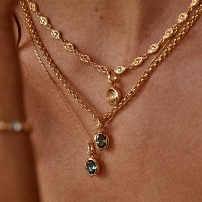 Stainless steel twelve birthday stone necklace with love pendant, featuring durable titanium steel construction.