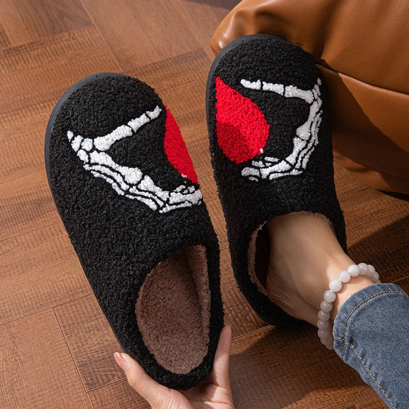 Halloween Skull Hand Slippers in black and white with non-slip soles