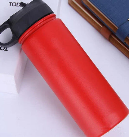 Premium stainless steel insulated tumbler with push-button lid and sleek design for outdoor adventures and active lifestyles.