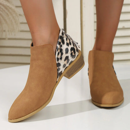 Women's leopard print boots with pointed toe and chunky heel, available in multiple sizes