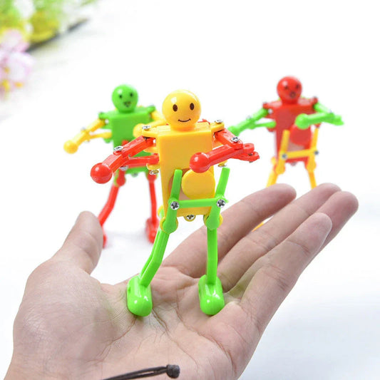 Clockwork wind-up toy robot performing captivating gymnastics display