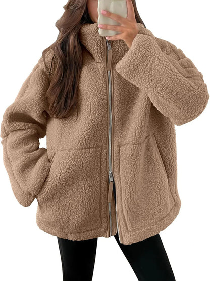 Classic padded fleece jacket in various colours for women, featuring a zip-up design and pockets