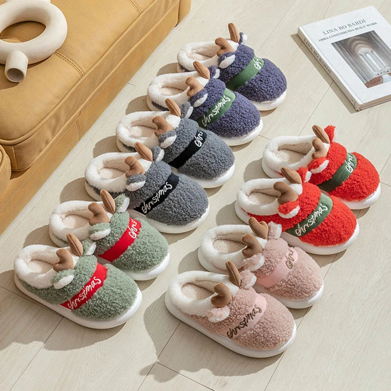 Cozy elk-themed slippers in a variety of festive colors, featuring a plush suede upper and supportive EVA sole for maximum comfort and warmth.