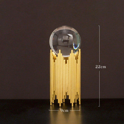 Elegant crystal ball home decor ornaments with a luxurious golden metal finish and minimalist modern design