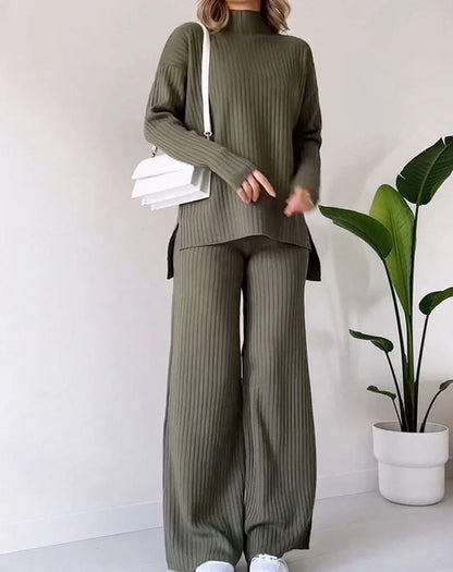 Women's turtleneck knitted suit set in white, black, or green with loose fit and straight trousers