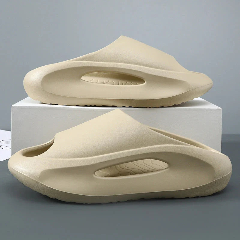 Stylish unisex beach slippers with a unique hollow, ventilated design for maximum breathability and comfort