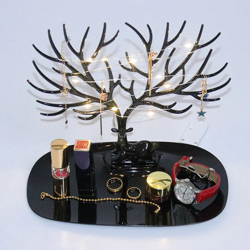 Deer Antler Jewelry Stand in white and black, displaying necklaces and earrings