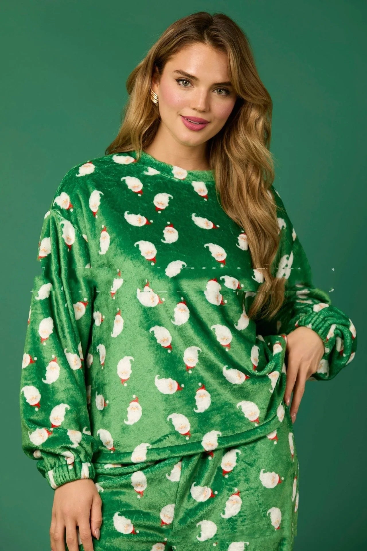 Women's festive flannel pajama set with Santa Claus design and long sleeves
