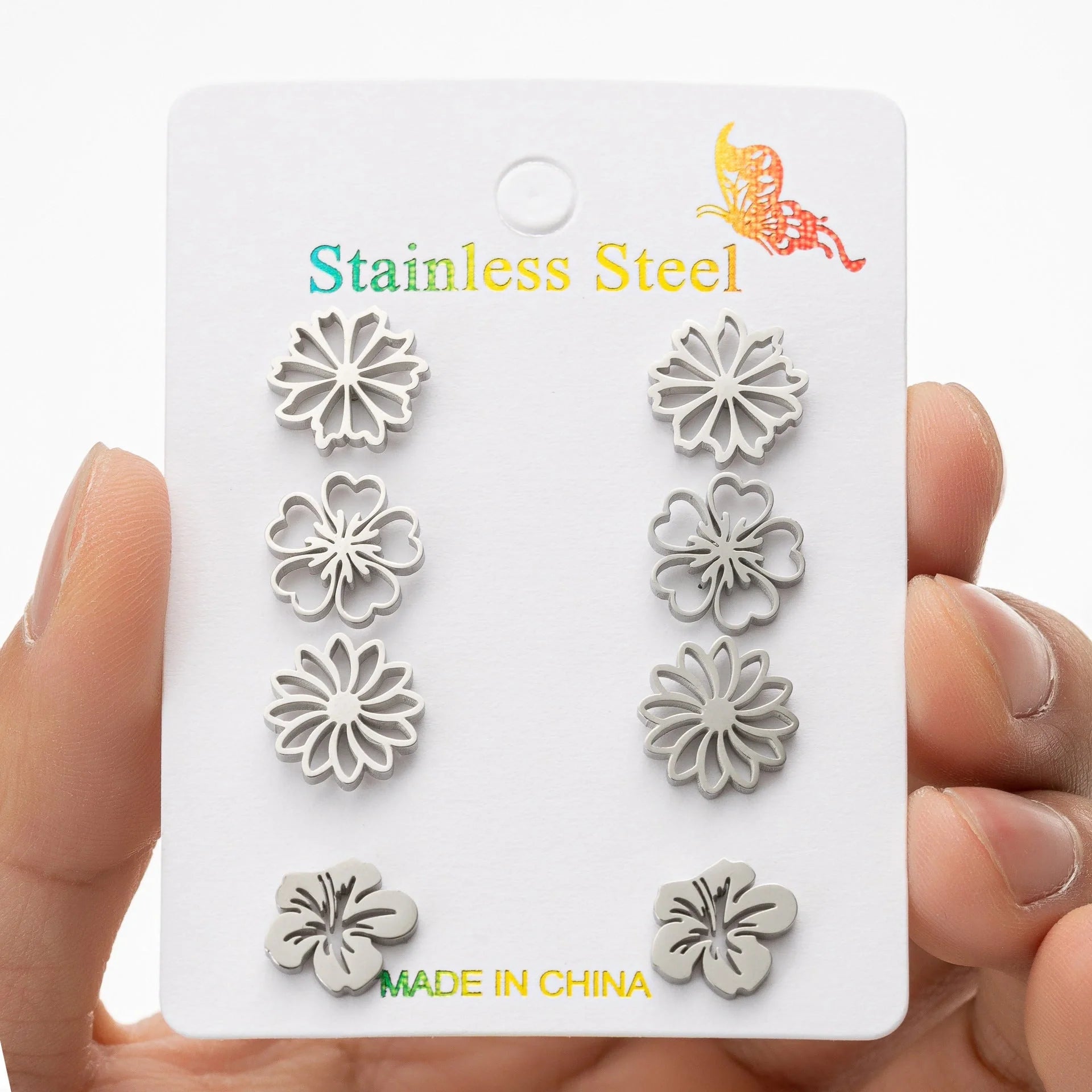 Fashion simulation stud earrings in gold, steel, rose gold, and black