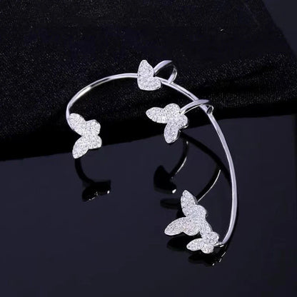 Sparkling butterfly-shaped ear cuffs with zirconia stones, available in gold and silver alloy finishes
