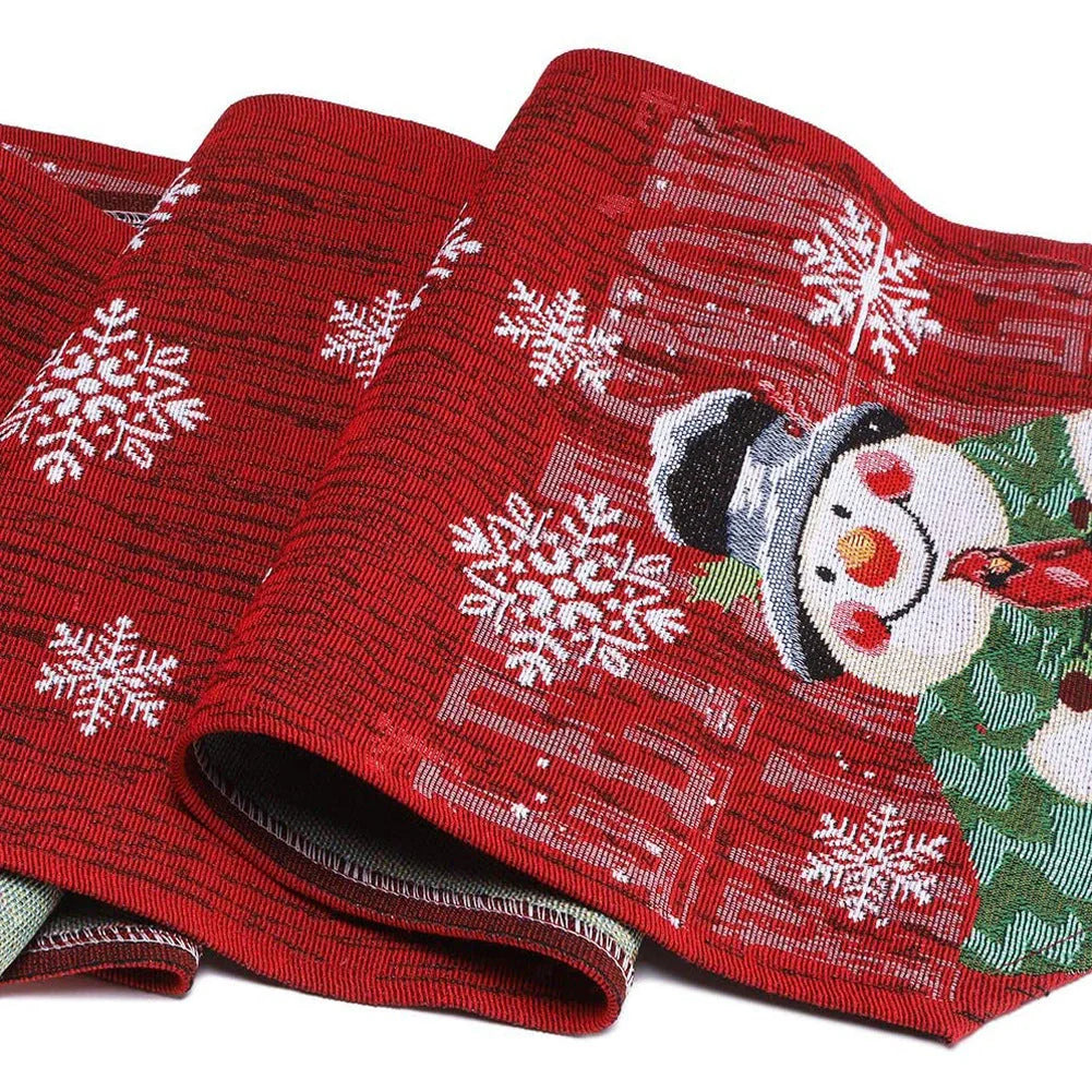 Christmas tablecloth with snowman and snowflake design in red