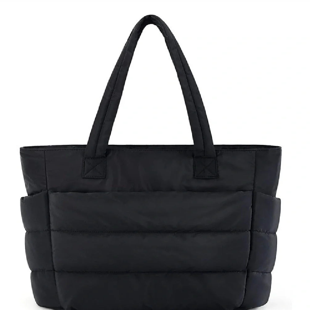 Premium cotton handbag with spacious design, secure zip-top closure, and thoughtful interior organisation for daily use