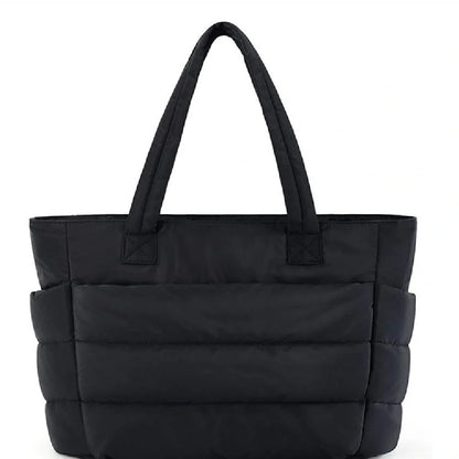 Premium cotton handbag with spacious design, secure zip-top closure, and thoughtful interior organisation for daily use