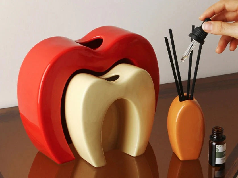 Creative Bionic Vase in white porcelain with colour glaze, featuring avocado and apple designs