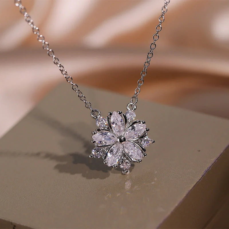 Exquisite zircon jewellery set with double-layered flower design and shimmering cubic zirconia stones