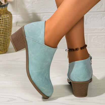 Women's chunky heel ankle boots with side zipper in navy blue, black, and khaki