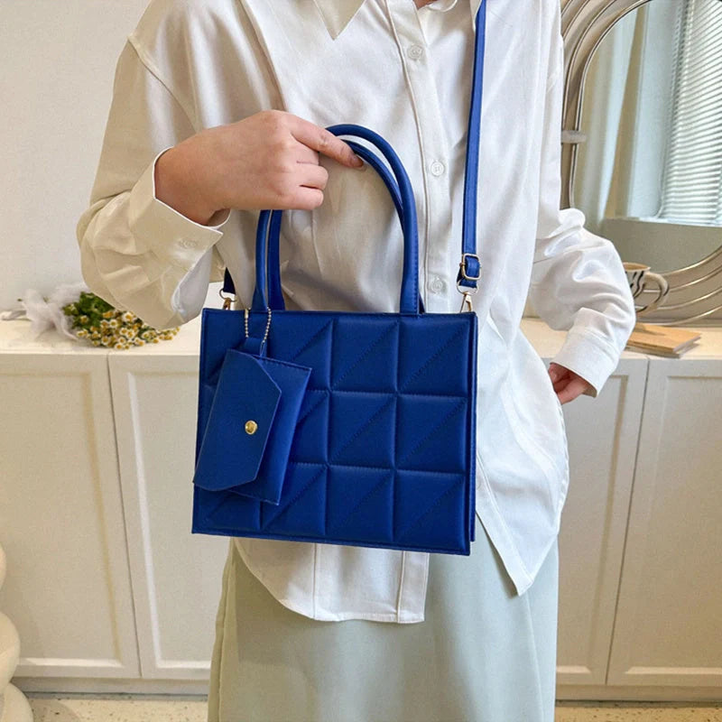 Chic plaid shoulder bag with wallet for women, available in black, white, blue, and green