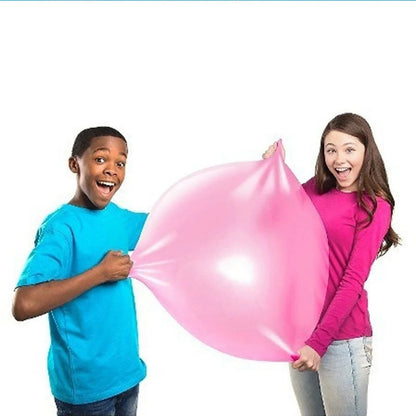 Oversized inflatable bounce balls in various vibrant colors for fun parties and celebrations