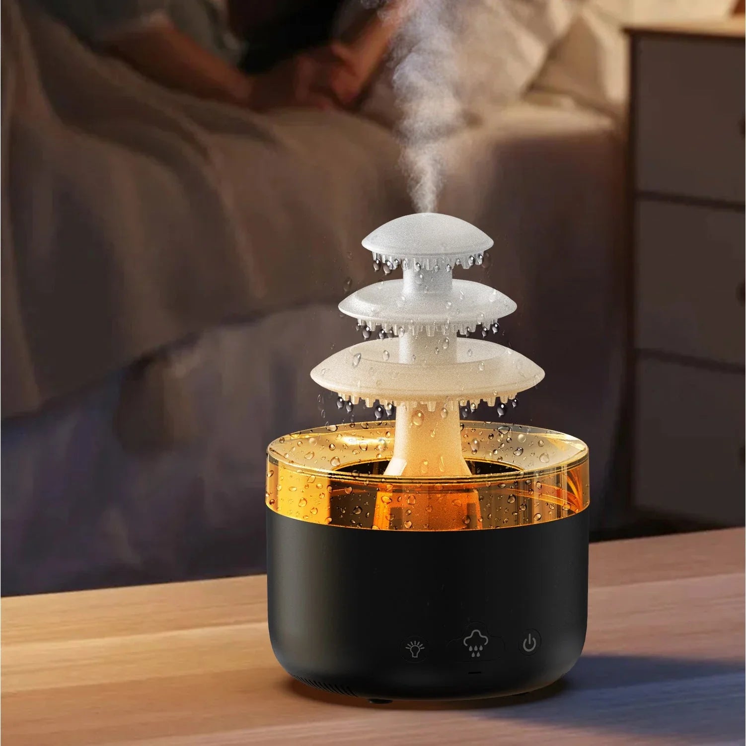 A white humidifier with a cloud-shaped design, featuring color-changing lights and essential oil diffuser capabilities.