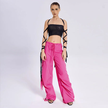 Stylish women's tank top with elastic cross-arm straps, available in black color