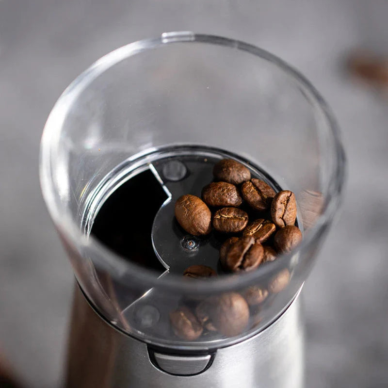 Premium stainless steel electric coffee grinder with adjustable grind settings, USB charging, and sleek modern design