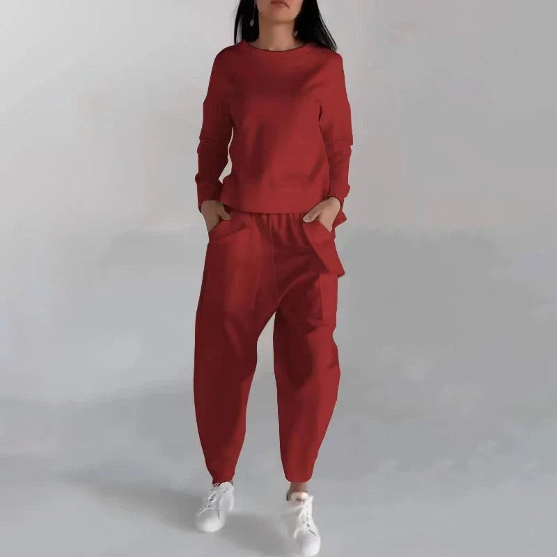 Stylish polyester sweatshirt with back slit, pockets, and available in various colors
