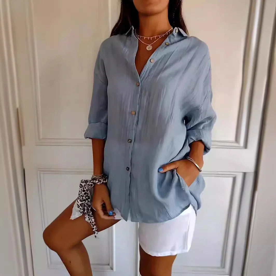 A stylish long-sleeved shirt with a pleated design, available in a variety of colours to suit any occasion.