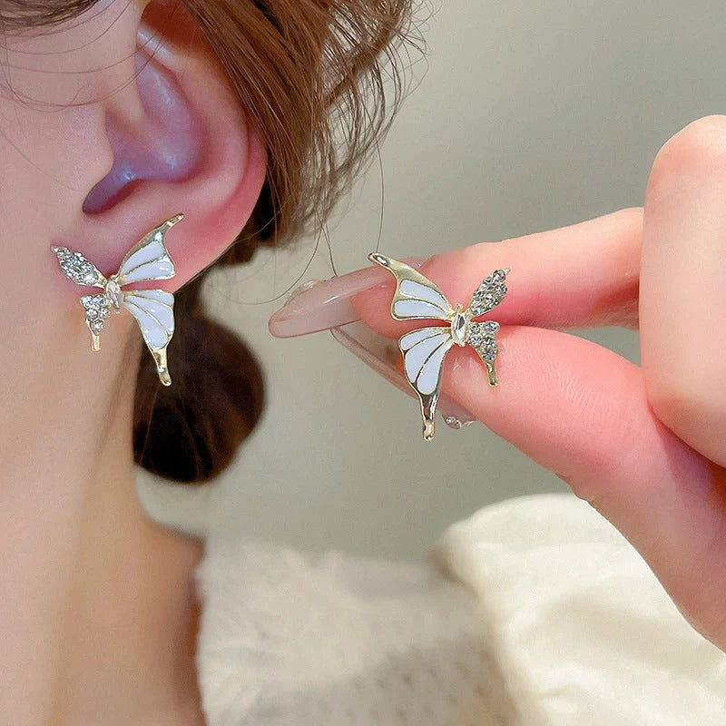 Rhinestone Dripped Butterflies Stud Earrings in alloy with diamond treatment