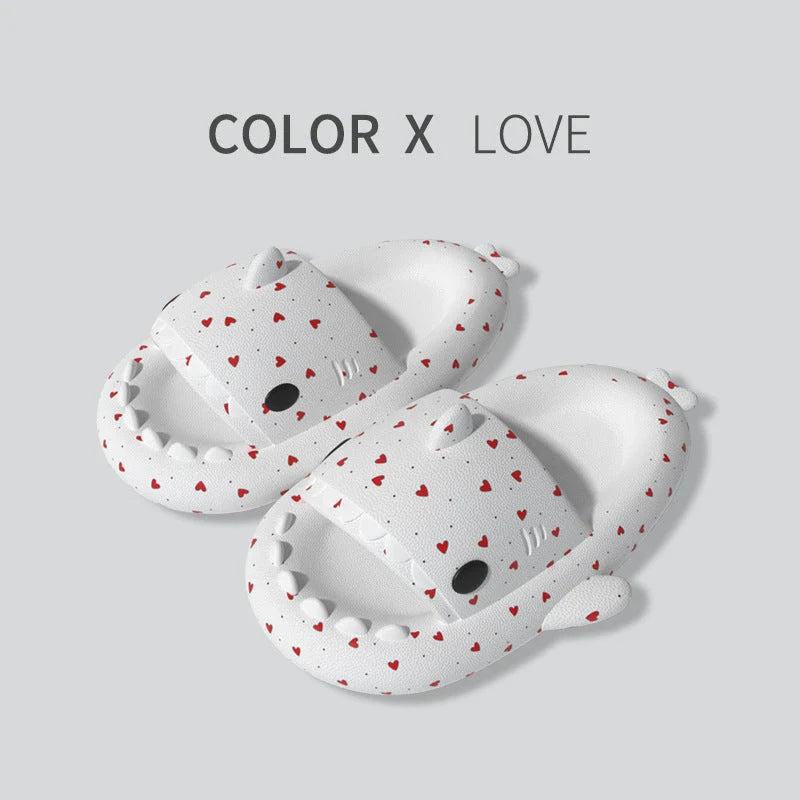 Cute shark-themed slippers with heart print design in various vibrant colors