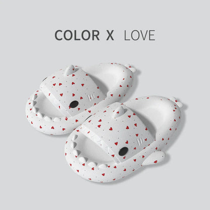 Cute shark-themed slippers with heart print design in various vibrant colors