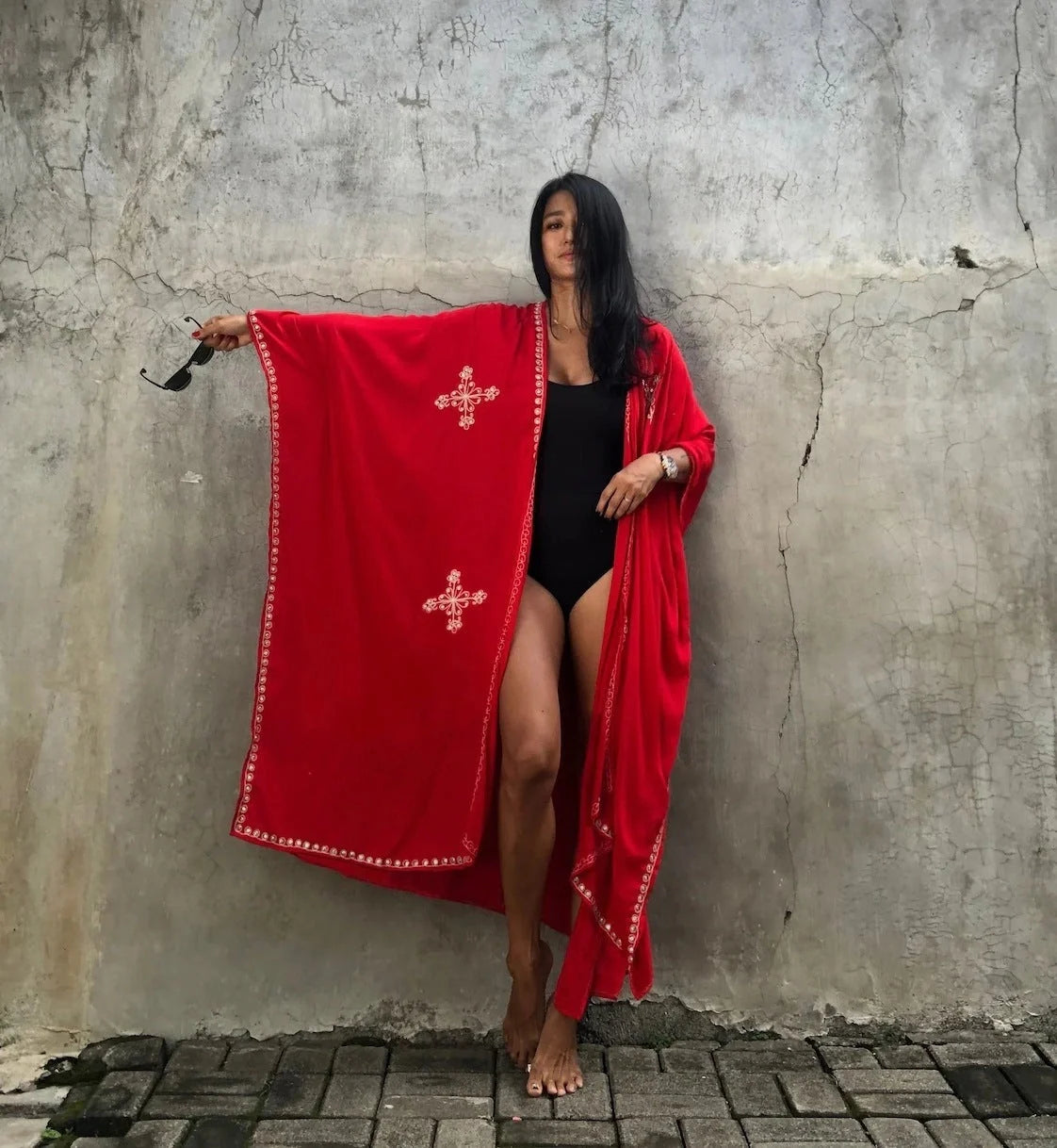 Fashionable rayon beach cardigan with vibrant embroidered design, offering sun protection and versatile style for coastal holidays