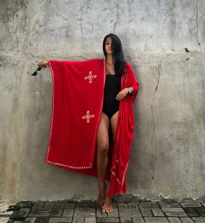 Fashionable rayon beach cardigan with vibrant embroidered design, offering sun protection and versatile style for coastal holidays