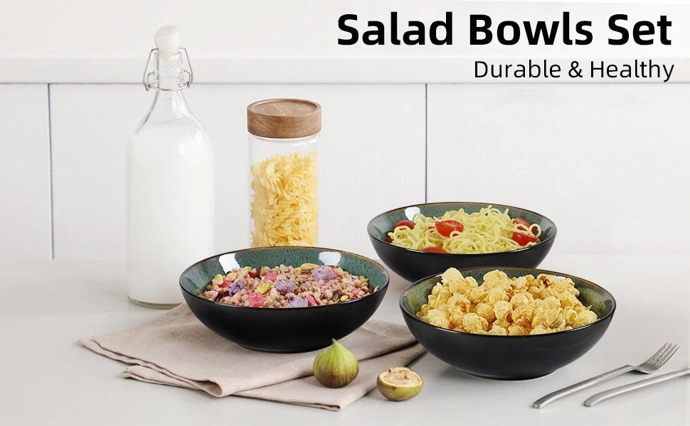 Set of four peacock green ceramic bowls with kiln change finish, 30oz capacity