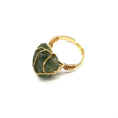 Handcrafted agate stone ring featuring an array of natural gemstones in various colours, with an adjustable design for a customized fit.