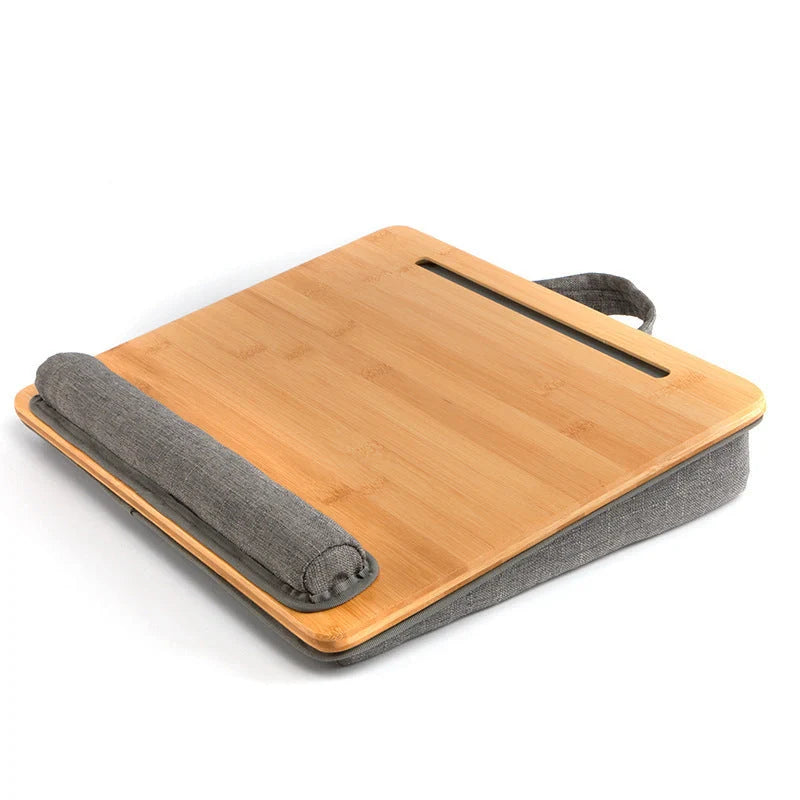Elegant bamboo lap desk with cushioned surface and card slots for relaxing laptop use